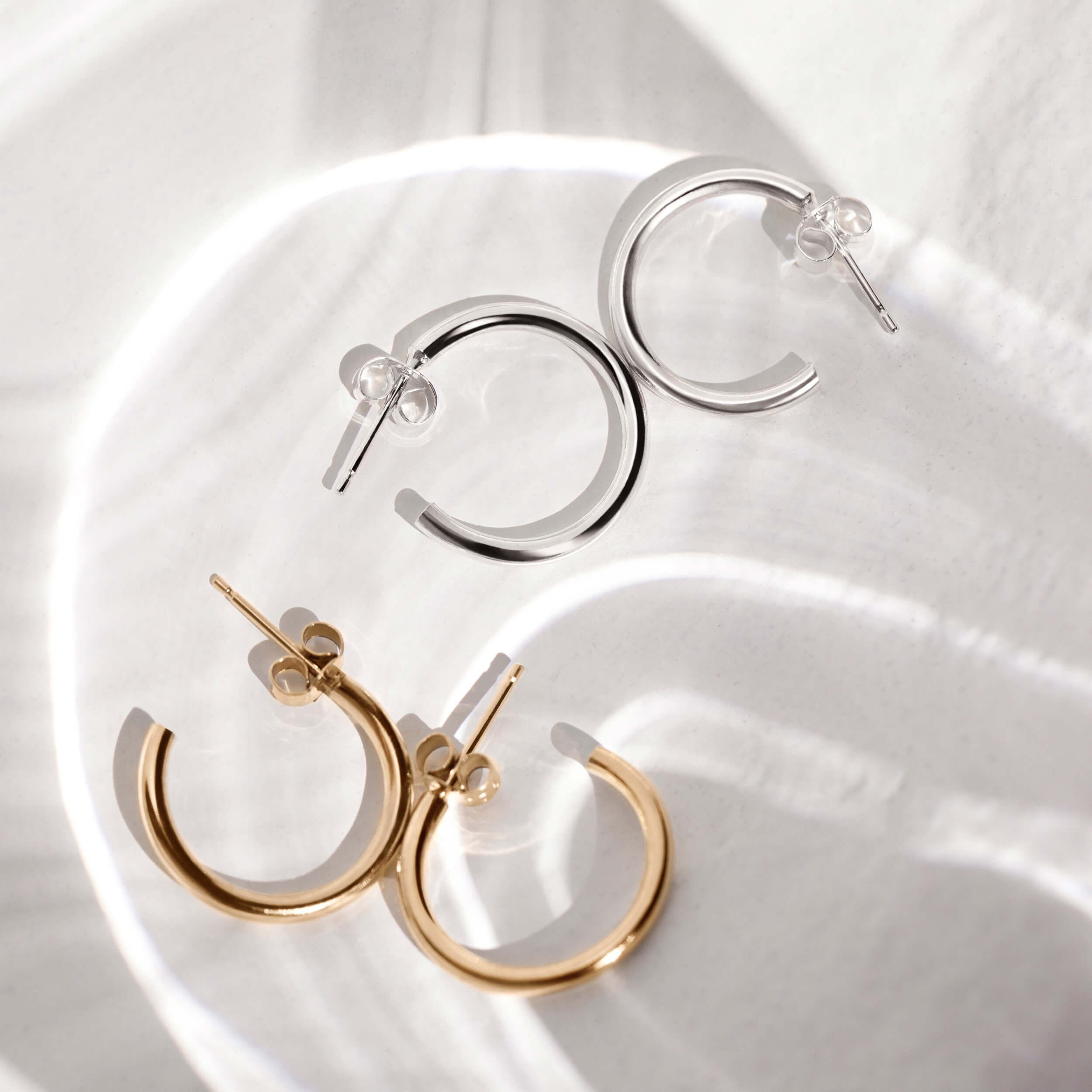 silver huggies, gold huggies