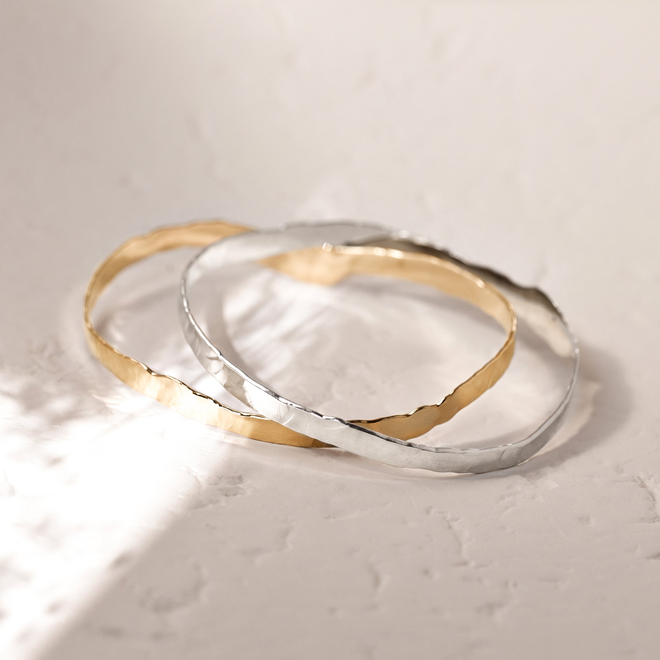 gold earth bangle, silver earth bangle, hammered bangle, eleanor jewellery design bangle, ejd bangle, manchester bracelet, bangle made in the uk, handmade silver bracelet