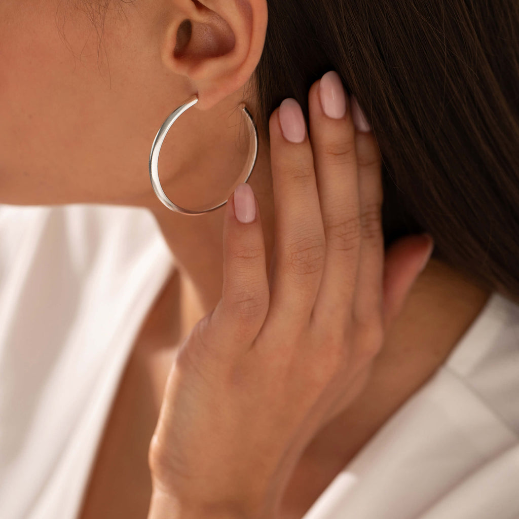 eleanor jewellery design, chunky large hoops, solid silver hoops